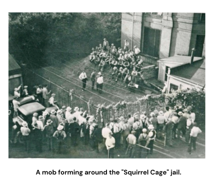 A mob forming around the Squirrel Cage jail