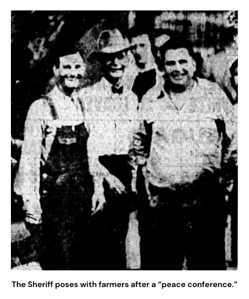The Sheriff poses with farmers