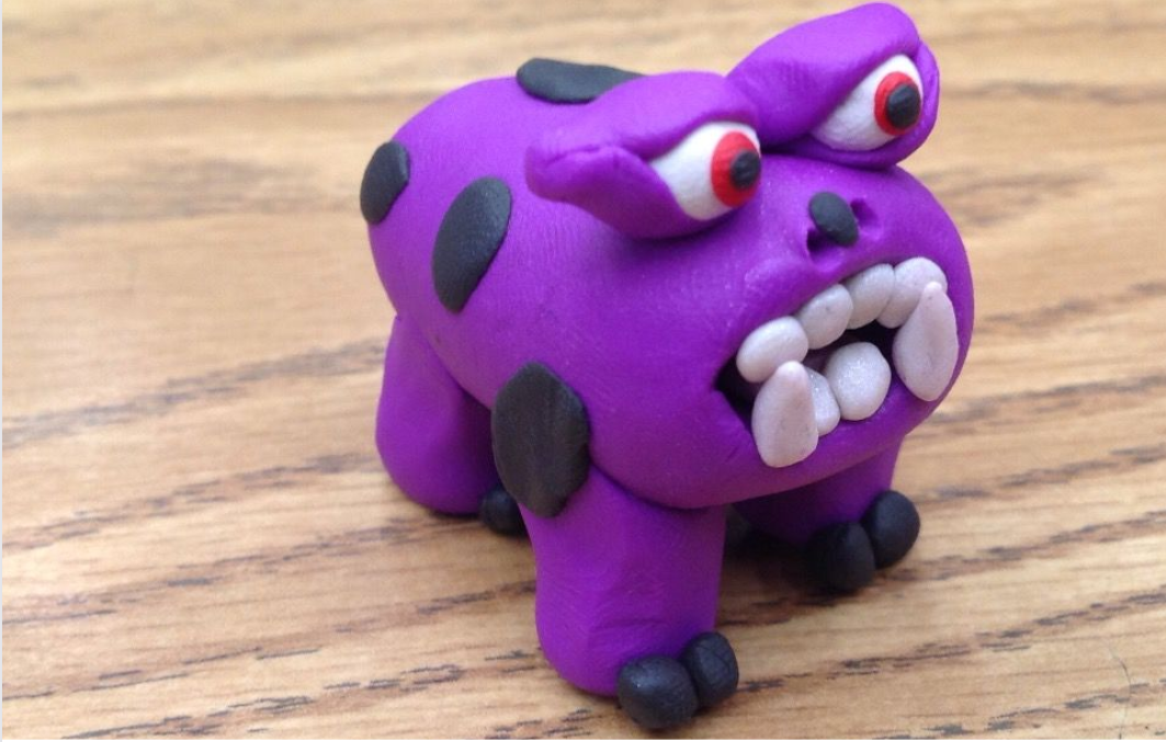 purple four legged clay monster