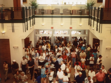 People entering doors of library