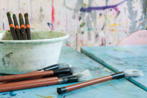 paint brushes on a table