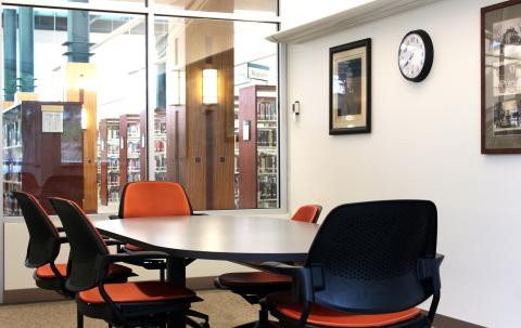 Table with six swivel chairs