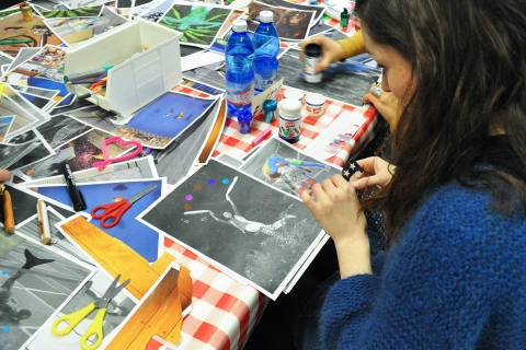 Individual working on a zine