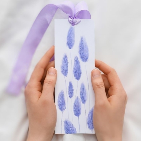 hand holding custom bookmark