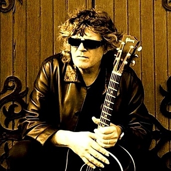 Photo of Claude Bourbon, acoustic guitarist