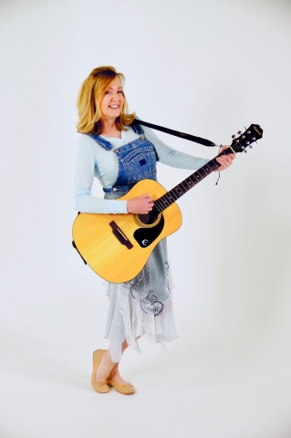 Lori Lynn playing a guitar
