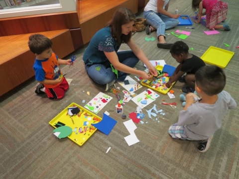 toddlers using art materials
