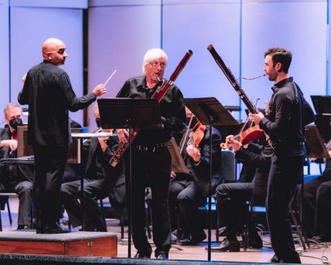 People playing the bassoon.