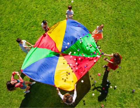 Children playing with a parachute.