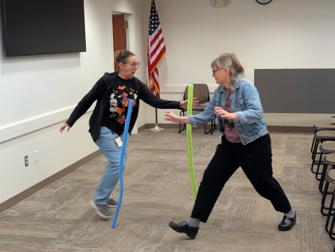 Playing the pool noodle game.