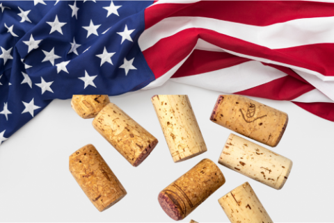 United States flag in background with wine corks below 