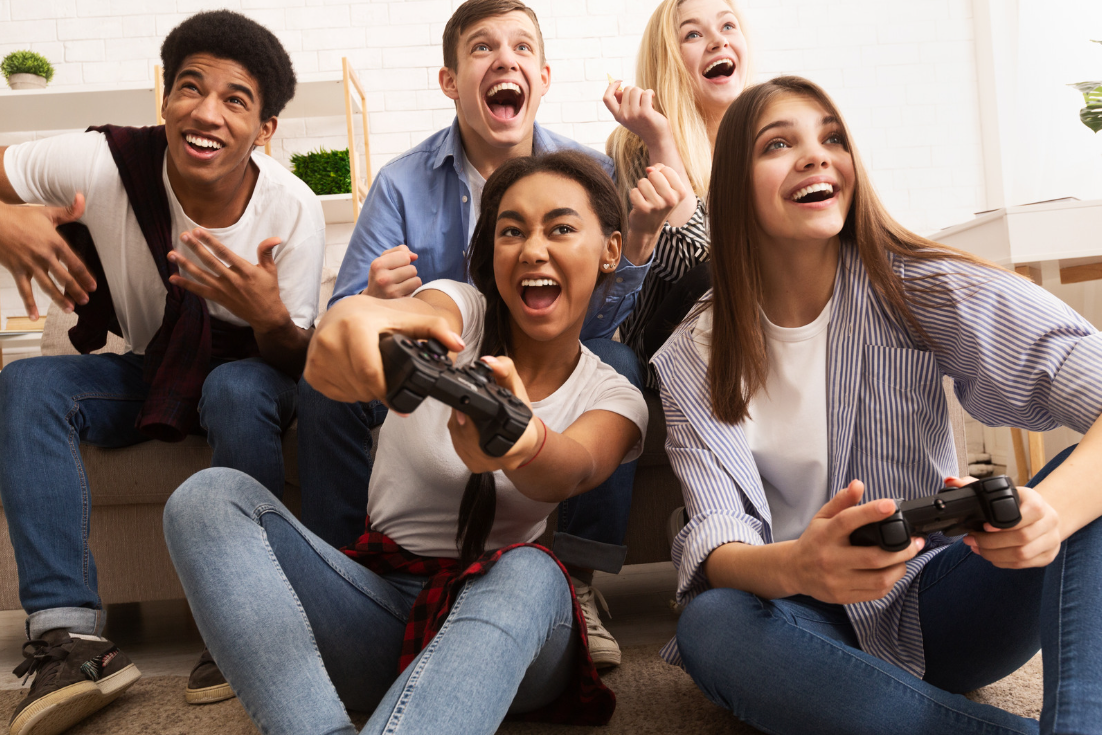 Group of teenagers playing video games