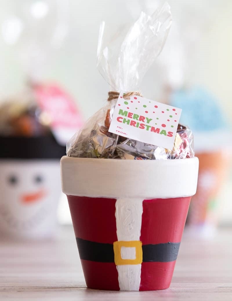 pot painted to resemble santa's suit