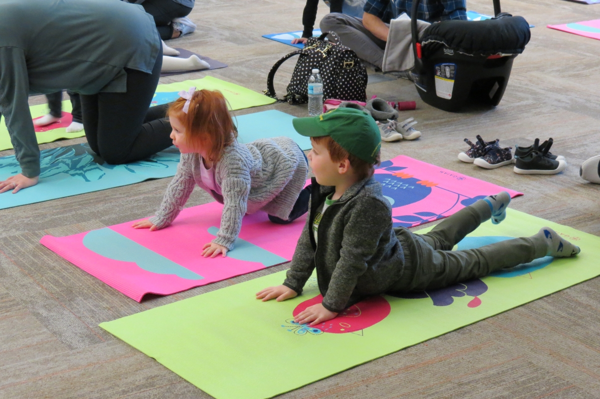 Children doing yoga.