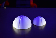 Two 3D printed half-sphere photo stand