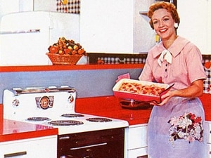 Women in kitchen by stove