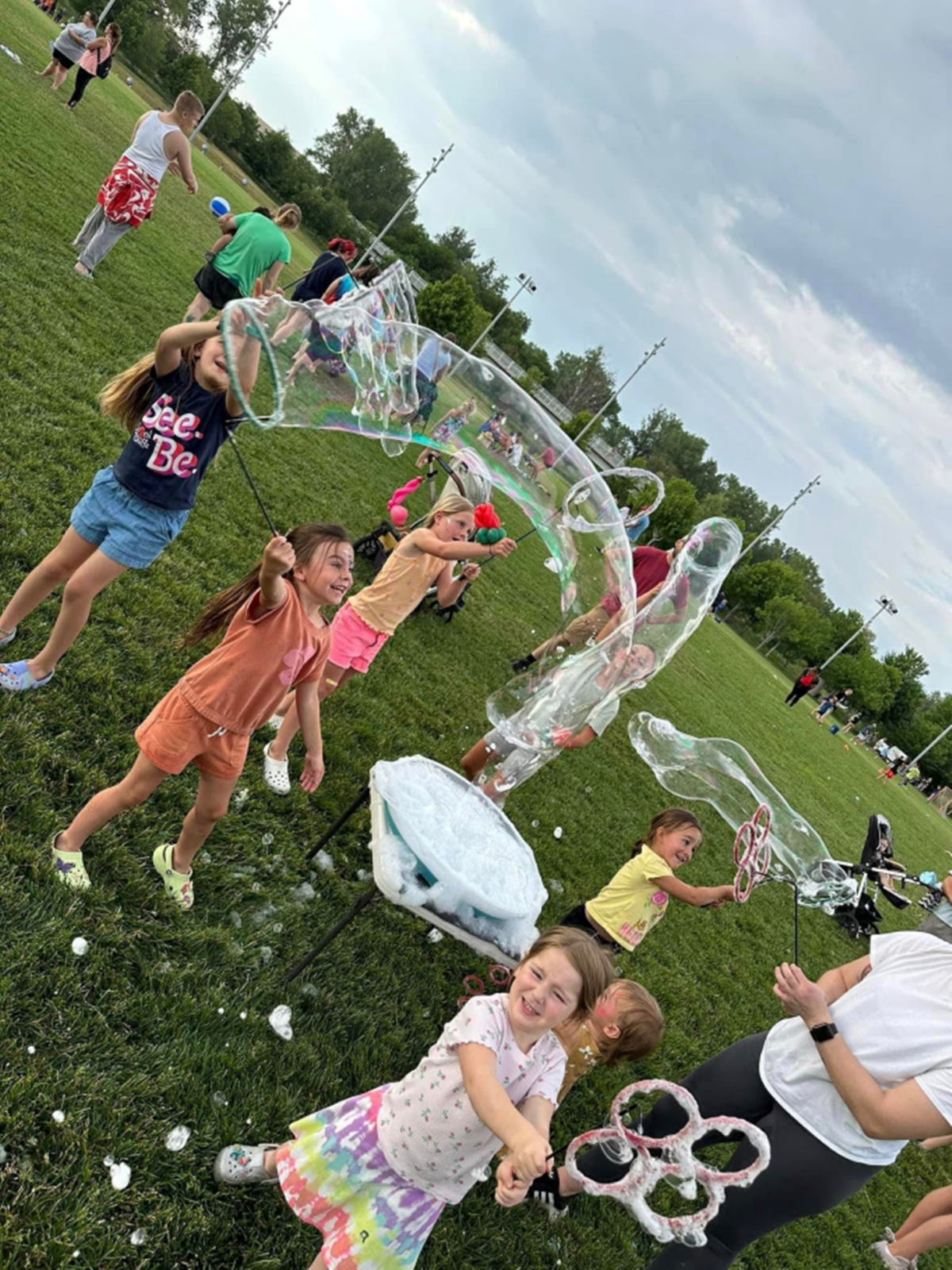 children playing with bubbles