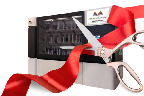 Scissors cutting red ribbon in front of Library Kiosk