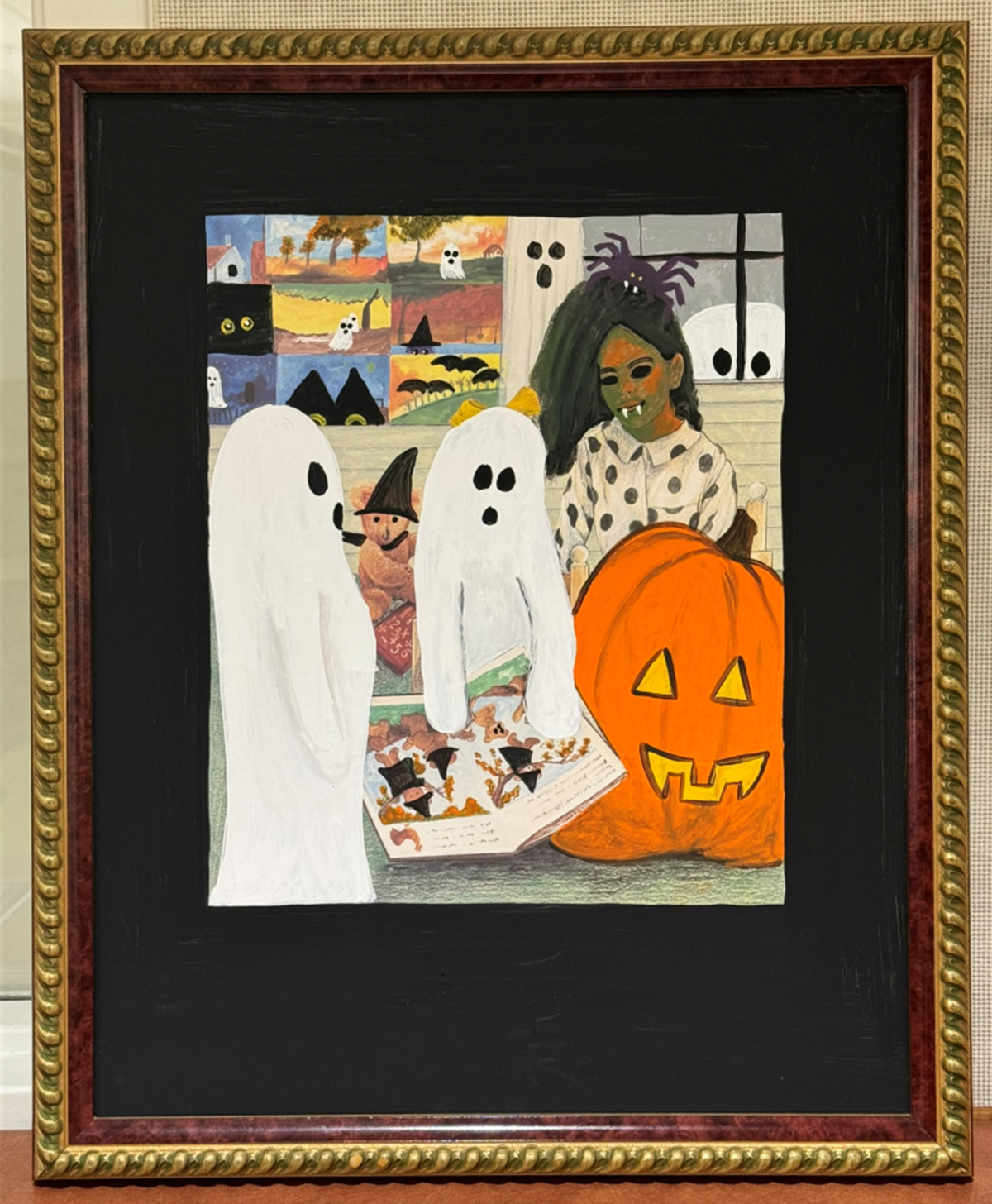 Zombie, pumpkin and ghosts on an upcycled portrait.