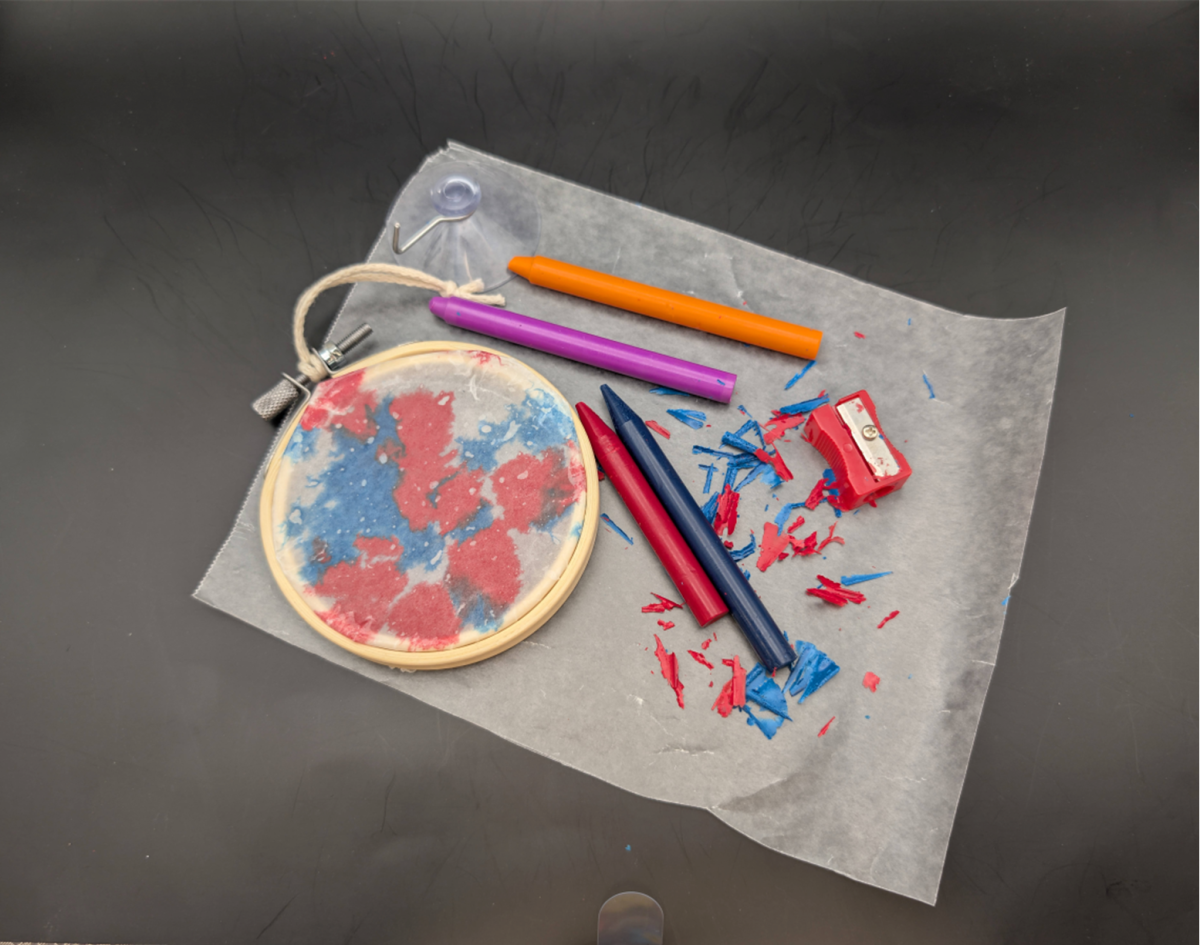 Crayon suncatcher and crayons.