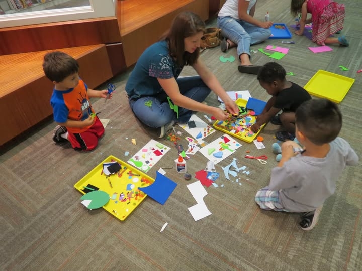 toddlers using art materials