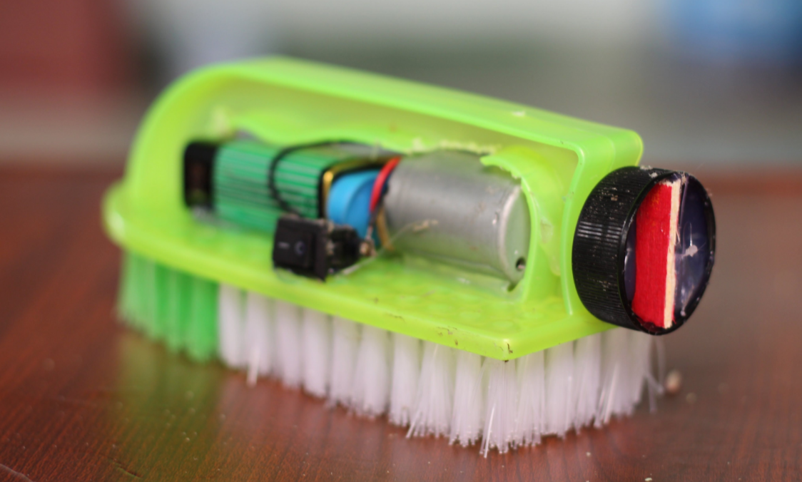 small machine with bristles