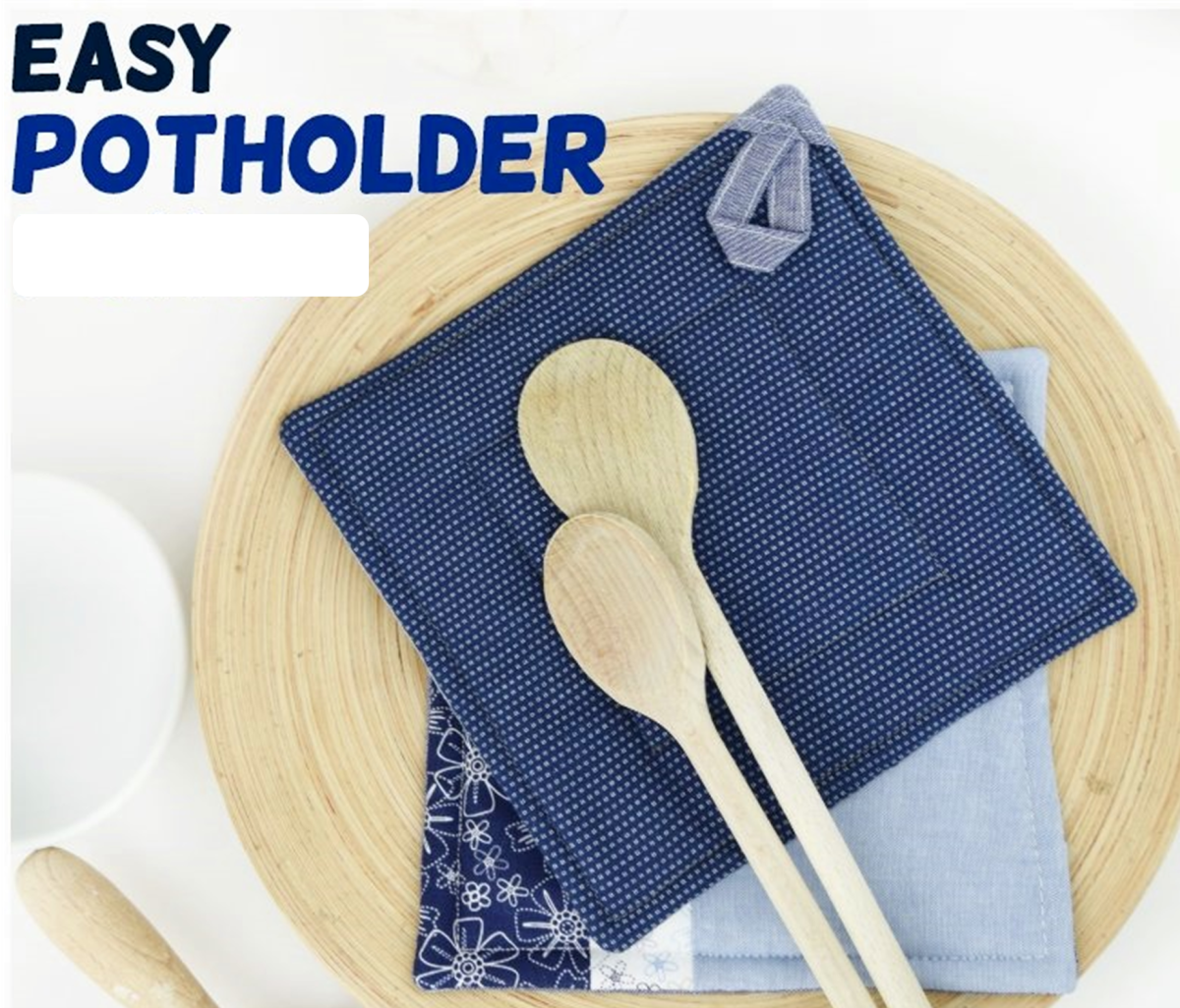 Two spoons and two potholders with the words Easy Potholder.