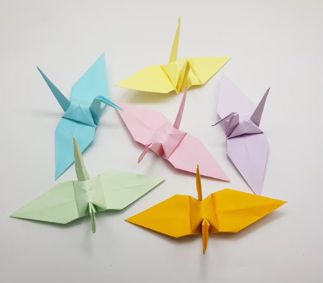 examples of a pot-it note crane origami