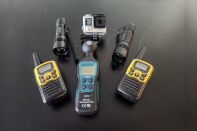 Ghost hunting kit: flashlights and walkie talkies.